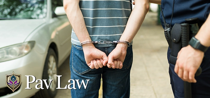 Man being arrested for misdemeanor charge 